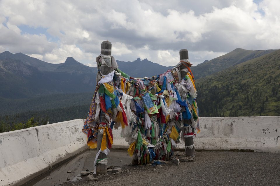 An ovaa - Buddhist prayer ribbons and blessing scarves tied to poles - at Buibinsky Pass on the M-54 - basically the only road that connects Tuva with the rest of Russia.