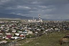 Eastern outskirts of the Tuvan capital Kyzyl with a Soviet-era unfinished power station towering over it. Lack of power generation capacity causes frequent power outages both in the capital and rural areas. Of Russia's 83 regions, Tuva is the worst economic performer largely relying on federal subsidies.