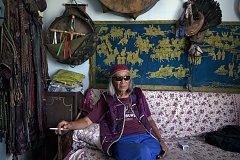 Nikolay Öorzhak, a shaman, in his Kyzyl office. Trained as a stage designer in Moscow, he later served as art director of the Tuvan National Theater in Kyzyl. In 1990, he founded Tuva's first community of shamans. "You can understand shamanism only if you become a shaman yourself. Shamanism is not a religion", he says, "it is a foundation of all religions. God is the energy of the universe, all else - Buddha, Christ - are just images". Mr Öorzhak says he receives many Western visitors, mostly psychologists, and has traveled extensively around the world.