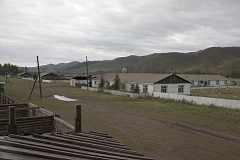 Kachyk, a remote and hard-to-get village near the Mongolian border. The building with the antenna on the right is the village's elementary school. The isolated Kachyk community has about 300 residents, partly living in the village itself, partly - at nomadic stations in the surrounding valleys. There's no police, no doctors, no shops in the village. Electricity is produced by a portable generator and is only available when it's dark. According to Moscow-based sociologist Artemiy Pozanenko who has been studying spacially isolated communities in the post-Soviet world, they tend to be more cohesive and self-sustainable because in part of unlimited access to natural resources around them and absence of regulatory authorities. A school is the only institution in these communities thanks to which they continue to exist. In late 1960s, all residents of Kachyk have been airlifted by the Soviet authorities of Tuva to the nearest bigger village Naryn, about 100 km away, because of poor acess but after the breakup of the Soviet Union many of them returned to their ancestral homes.