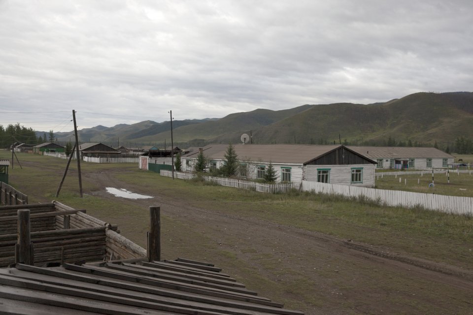 Kachyk, a remote and hard-to-get village near the Mongolian border. The building with the antenna on the right is the village's elementary school. The isolated Kachyk sumon (community) has about 300 residents, partly living in the village itself, partly - at nomadic stations in the surrounding valleys. There's no police, no doctors, no shops in the village. Electricity is produced by a portable generator and is only available when it's dark. According to Moscow-based sociologist Artemiy Pozanenko who has been studying spacially isolated communities in the post-Soviet world, they tend to be more cohesive and self-sustainable because in part of unlimited access to natural resources around them and absence of regulatory authorities. A school is the only institution in these communities thanks to which they continue to exist. In late 1960s, all residents of Kachyk have been airlifted by the Soviet authorities of Tuva to the nearest bigger village Naryn, about 100 km away, because of poor acess but after the breakup of the Soviet Union many of them returned to their ancestral homes.