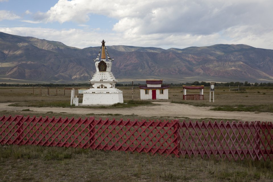 Buddhist sanctuary Dupten Sheduplin near Sug-Aksi in western Tuva, with Alash Plateau visible in the background. After Tuva has formally joined the Soviet Union in 1944, all monks were prosecuted and temples completely destroyed to help Communist ideology take hold instead. After the breakup of the Soviet Union, Buddhism has seen a controversial revival in Tuva, although it's the religion's power consolidating potential rather than its true meaning that's being prioritized by the authorities all over Russia irrespective of whether it's Christianity, Islam or Buddhism.