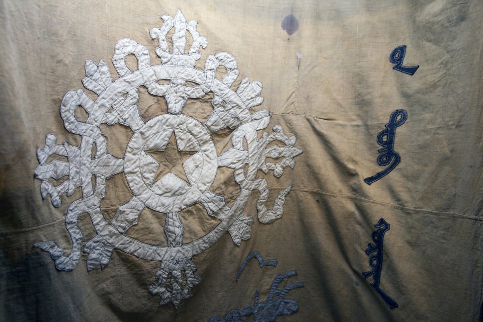 Detail of the first Tuvan flag dating back to 1921 preserved at the National Museum in the capital Kyzyl. Once part of a vast medieval Turkic Khaganate, the territory of the present-day Tuva changed hands many times. From mid-18 century and up until 1912 it was a province of the Chinese Qing Empire. China did not rule Tuvans directly though, outsourcing it to the Mongols, themselves part of the Qing Empire until 1911. When the latter fell apart, the Tuvan tribal leaders appealed to the Russian tsar Nicholas II for protection, and in 1914 a Russian protectorate known as Uriankhai Territory (a Mongol term for Tuvans) was established and its capital Belotsarsk (City of the White Tsar) founded. When the Russian Empire collapsed in turn just 3 years later, Tuva was left on its own until 1921 when it declared independence but delegated foreign policy to the new Soviet Russian government. It was only recognized by neighboring Russia and Mongolia though. Other countries continued to consider it a Chinese territory. Up until 1944 when the People's Republic of Tuva has formally joined the Soviet Union, it was de facto a Soviet protectorate as well, a sort of the Soviet Puerto Rico. Interestingly, the government of the Republic of China (Taiwan) continues to formally consider Tuva part of Greater China. Unusually for an overcentralized Russia, Tuva celebrates its main holiday coinciding with the day of independence (15 August) not the day when it was incorporated into the Soviet Union (11 October).
