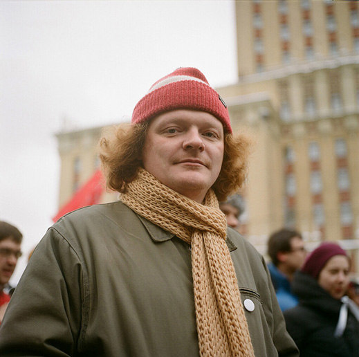 Dmitry, journalist, with a blank white badge - one of the symbols of the current protests