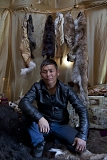 Saidash Kol, 28, a deer farmer and hunter from Todzha (a remote and hard-to-get area in northeastern Tuva), poses for picture in his tent he and his workers have built for the yearly stock farmers' festival Naadym in Tos Bulak. He also owns a fishery, a cafe and a hotel in his village. Once nomadic deer farmers, Todzha Tuvans no longer live in this kind of tents, preferring village homes, but some still know how to build a tent for special occasions such as Naadym.