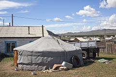 Bandan family home and a yurt in Naryn, southeastern Tuva. In summer, two generations of the Bandan family live in two yurts in the Kachyk river valley, some 100 km east of Naryn, from fall to spring the younger part returns to Naryn in order for the kids to attend school.
