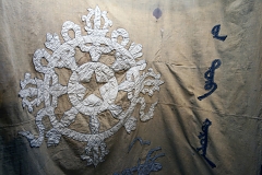 Detail of the first Tuvan flag dating back to 1921 preserved at the National Museum in the capital Kyzyl. Once part of a vast medieval Turkic Khaganate, Tuva became a remote province of Chinese-run Mongolia in 18th century and remained so until 1912. When the Qing Empire collapsed that year, Tuvan tribal leaders appealed to the Russian tsar Nicholas II for protection, and in 1914 a Russian protectorate known as Uriankhai Territory (Uriankhai was a Mongolian term for Tuvans) was established and its capital Belotsarsk (Russian for "City of the White Tsar") founded. When the Russian Empire collapsed in turn just 3 years later, Tuva was left on its own until 1921 when it declared independence but delegated foreign policy to the Soviet government. It was only recognized by neighboring Russia and Mongolia though while all other countries continued to consider it a Chinese territory. Up until 1944 when the People's Republic of Tuva has formally joined the Soviet Union, it was a de facto Soviet protectorate. Interestingly, Taiwan continues to formally consider Tuva part of Greater China. Unusually for an overcentralized Russia, Tuva celebrates its main holiday coinciding with the day of independence (15 August) not the day when it was incorporated into the Soviet Union (11 October).